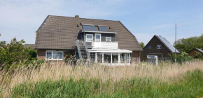 Отель Ferienwohnungen Haus Schau ins Land nah an der Nordsee  Эммельсбюль-Хорсбюлль